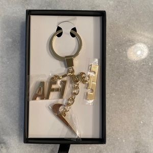 **SOLD**Nike 50th Anniv. Gold AF-1 Air Force 1 Swoosh LeBron James Keychain